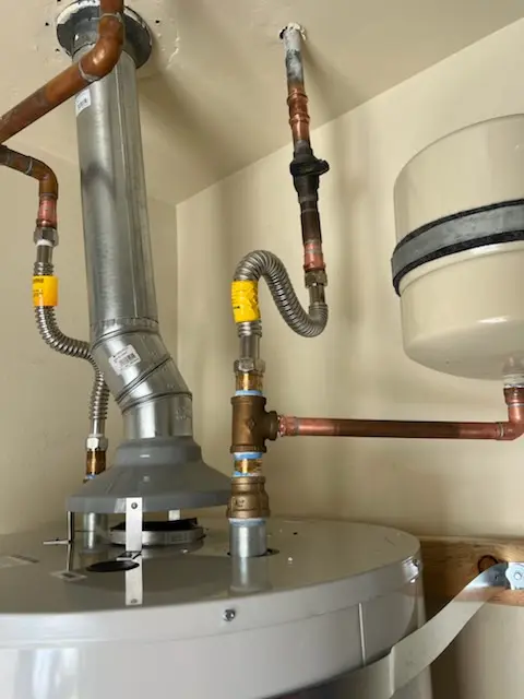 Water heater installation and plumbing repair in Slinger
